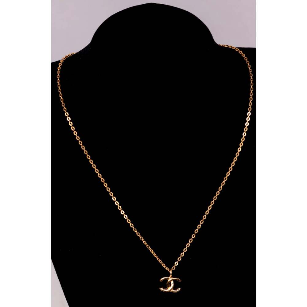 Chanel CC Logo Pendant Necklace Gold Tone Signed ©1982 France